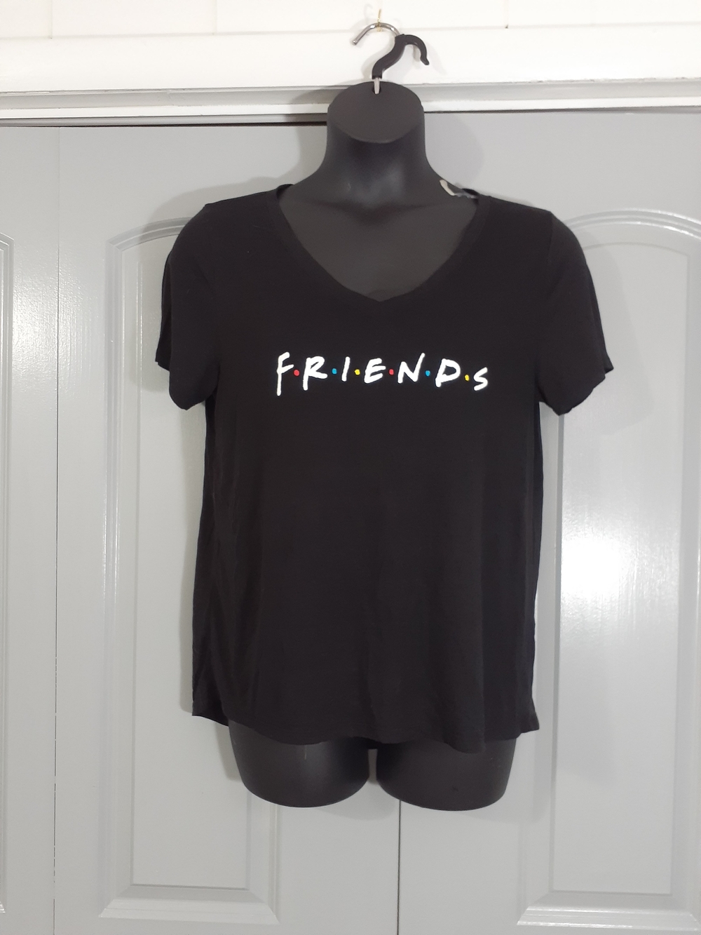 FRIENDS Black V-Neck Tee with White Logo and Multicolor Dots